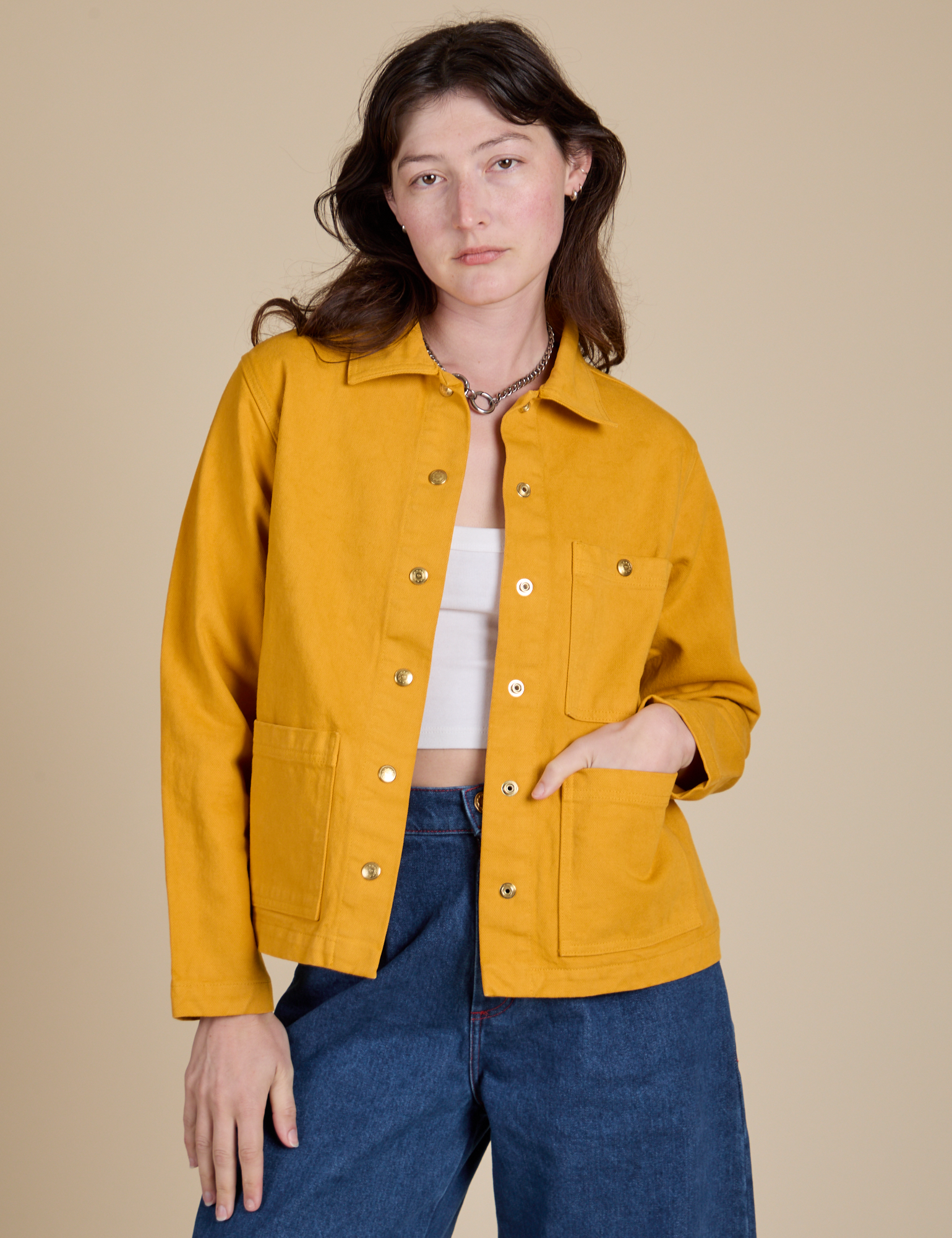 Alex is 5&#39;8&quot; and wearing P Denim Work Jacket in Mustard Yellow