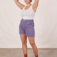 Tiara is wearing Classic Work Shorts in Faded Grape and vintage off-white Tank Top