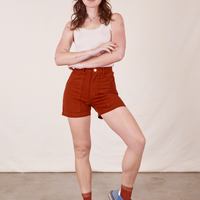 Alex is 5'8" and wearing XS Classic Work Shorts in Paprika paired with vintage off-white Tank Top