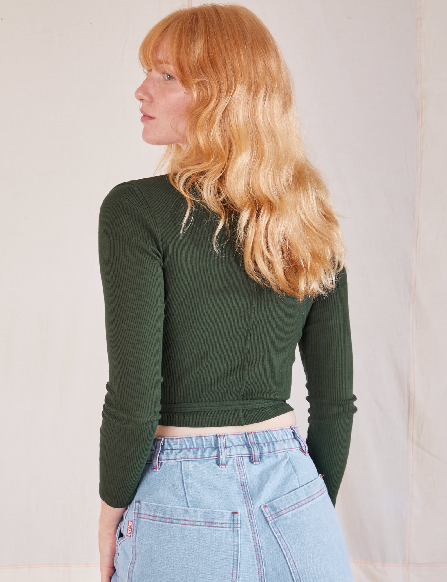 Wrap Top in Swamp Green back view on Margaret