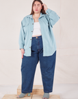 Marielena is wearing Flannel Overshirt in Baby Blue and dark wash Trouser Jeans