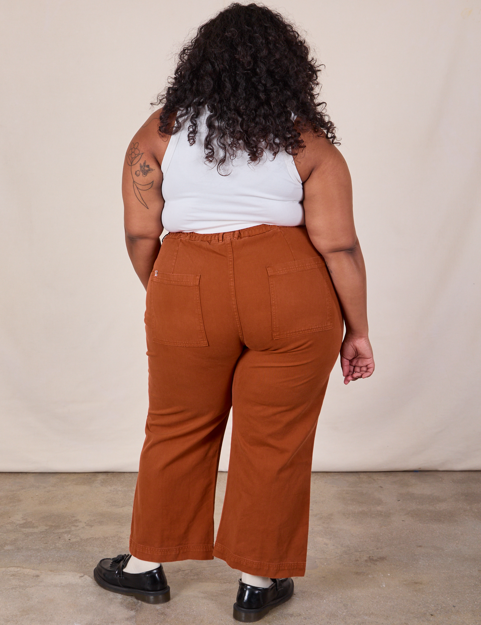 Back view of Western Pants in Burnt Terracotta on Morgan