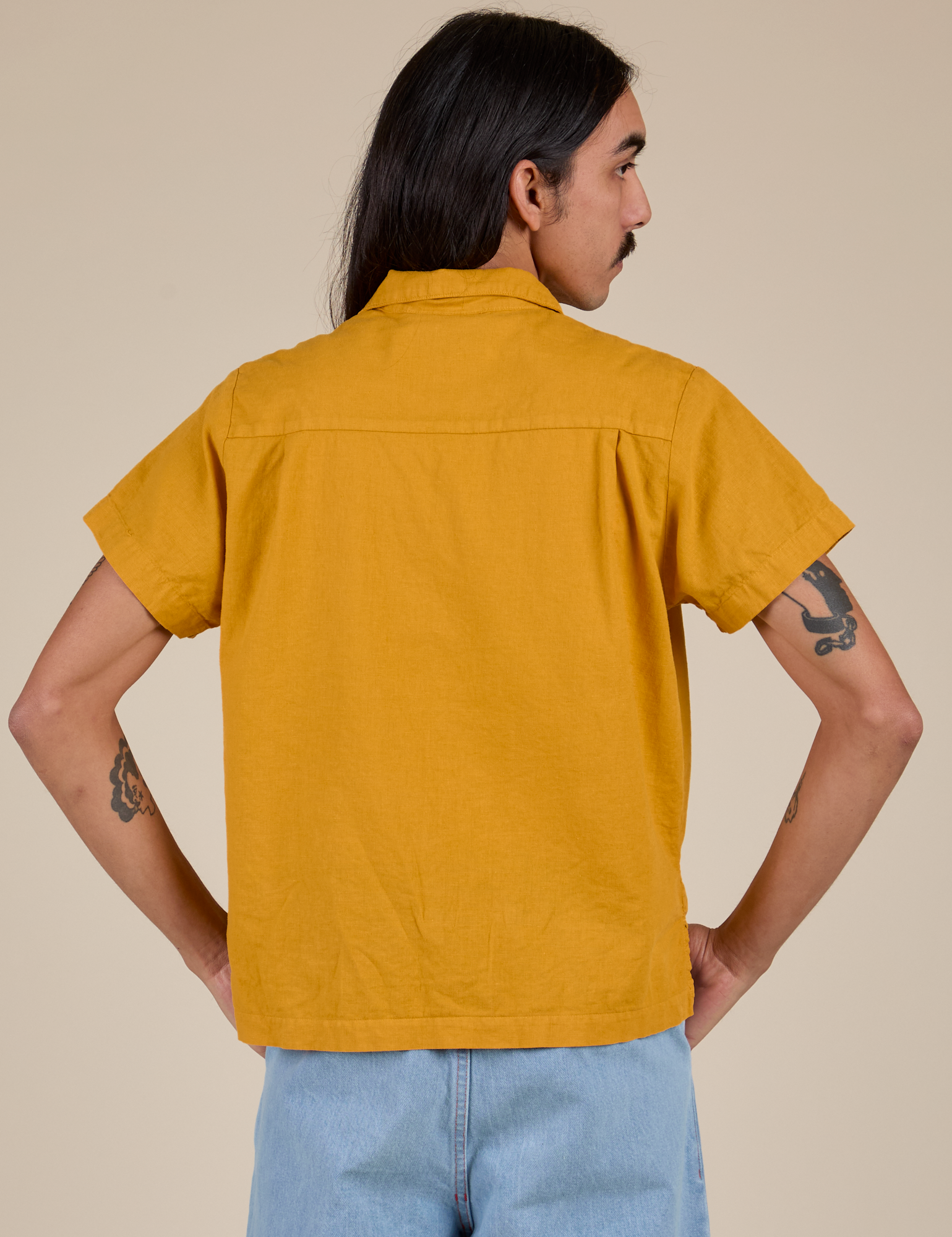 Pantry Button-Up in Mustard Yellow back view on Anthony