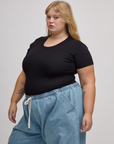 Angled front view of Baby Tee in Basic Black on Juliet