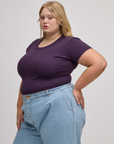 Angled front view of Baby Tee in Nebula Purple on Juliet