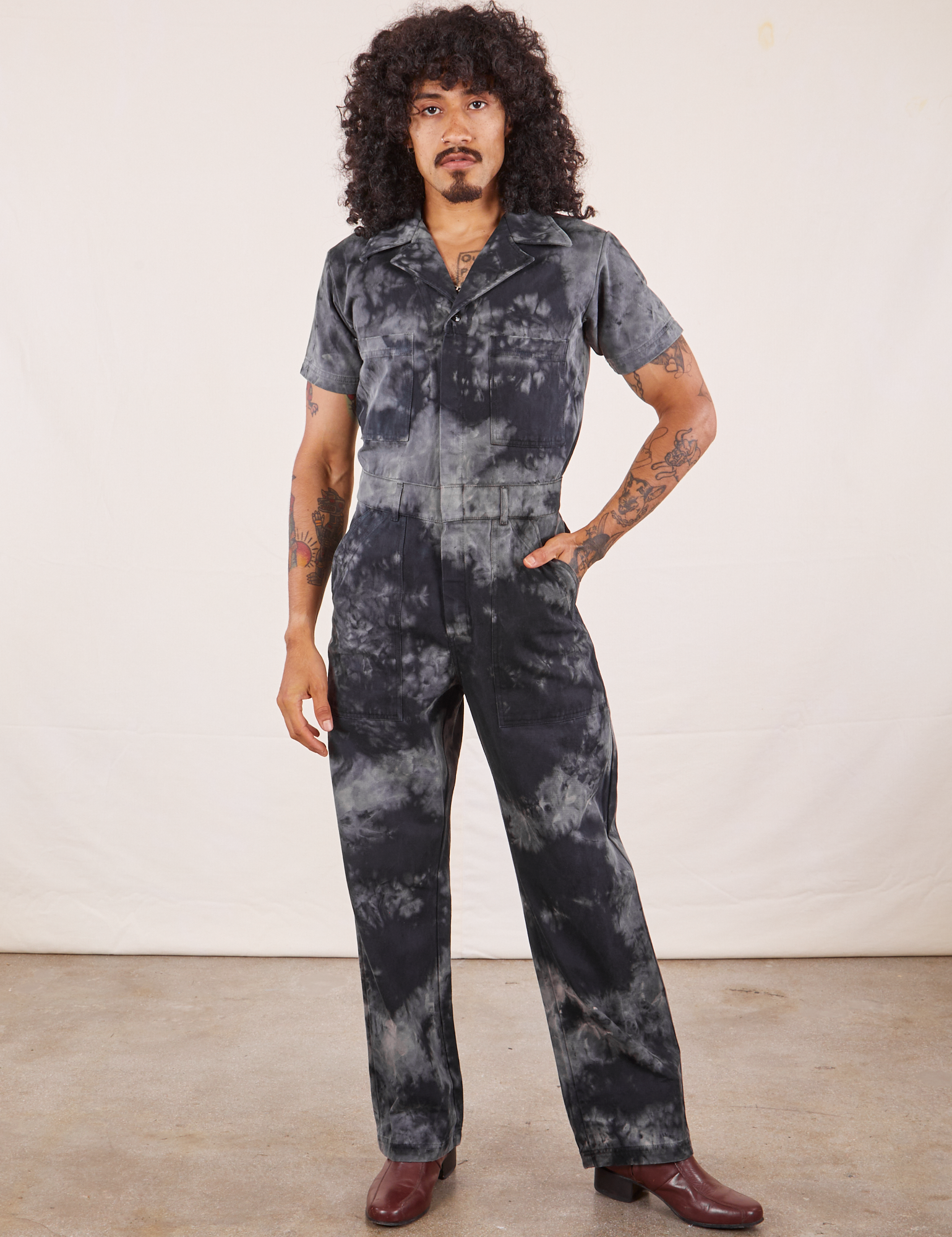 Jesse is 5&quot;8 and wearing S Short Sleeve Jumpsuit in Black Magic Waters
