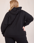 Oversized Hoodie in Basic Black back view on Juliet