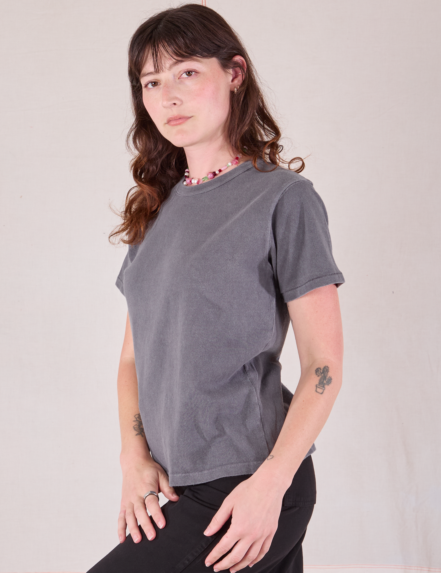 Burly Tee in Washed Grey angled front view on Alex