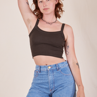 Alex is 5'8" and wearing P Cropped Cami in Espresso Brown paired with light wash Frontier Jeans