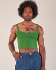 Jerrod is 6’3” and wearing S Cropped Cami in Lawn Green paired with dark wash Carpenter Jeans