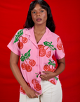 Kandia is wearing Cherry Pantry Button-Up