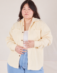 Ashley is 5'7" and wearing M Corduroy Overshirt in Vintage Off-White with a vintage off-white Cropped Tank underneath