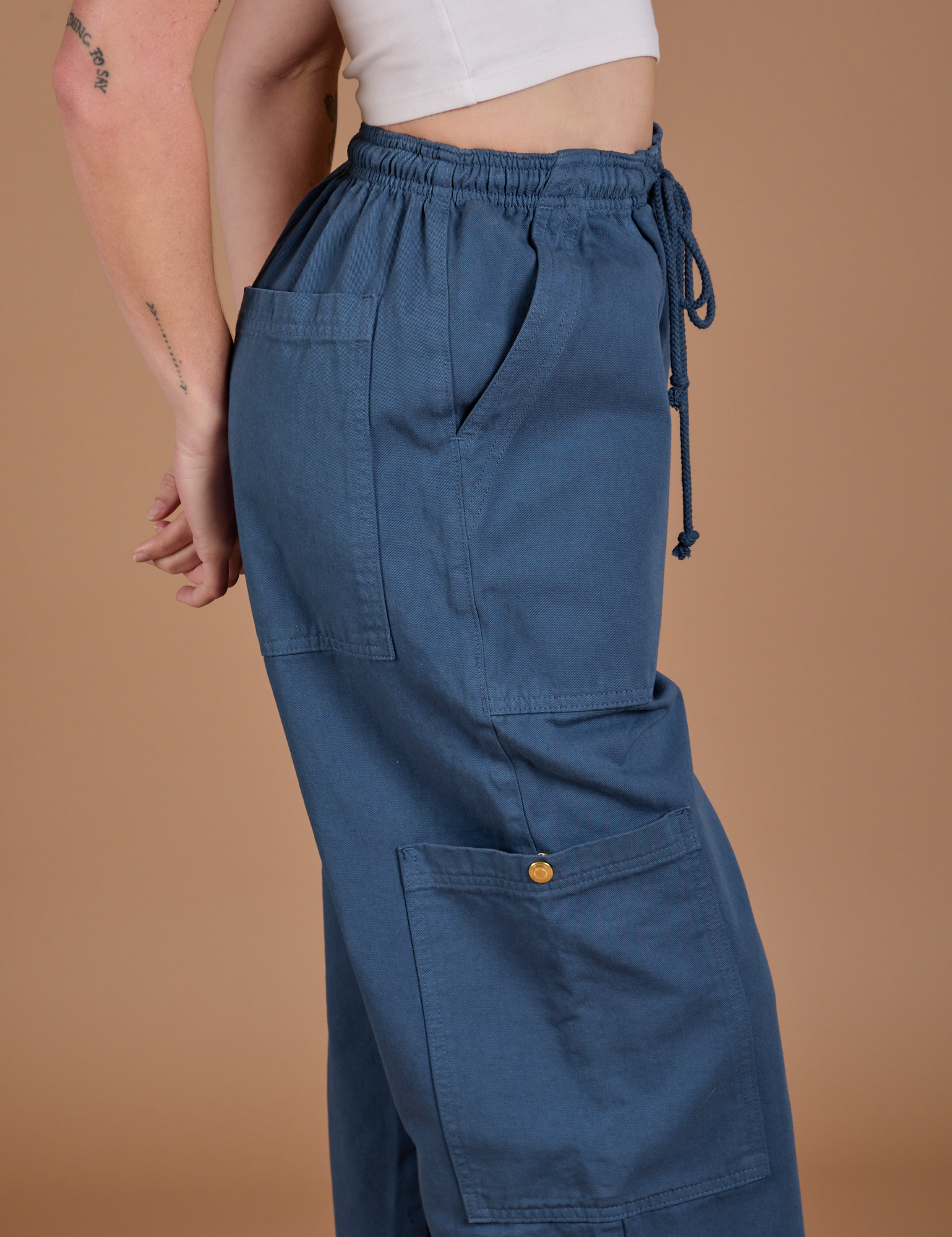 Drop Pocket Cargo Pants in French Blue side close up on Alex