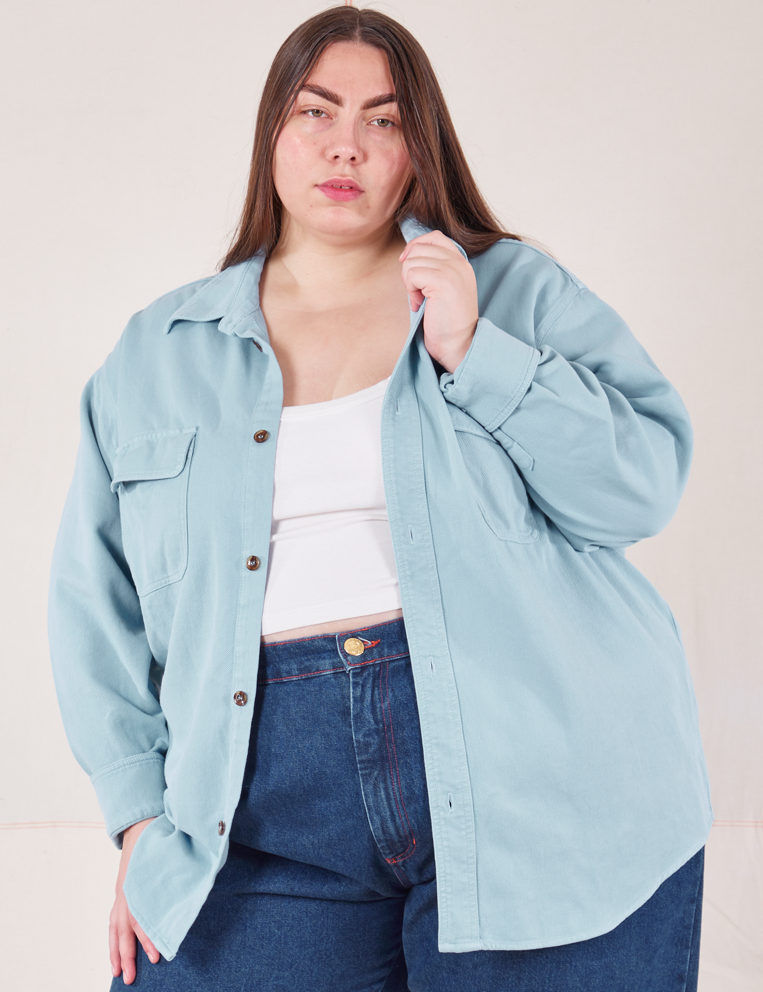 Marielena is wearing Flannel Overshirt in Baby Blue and dark wash Trouser Jeans