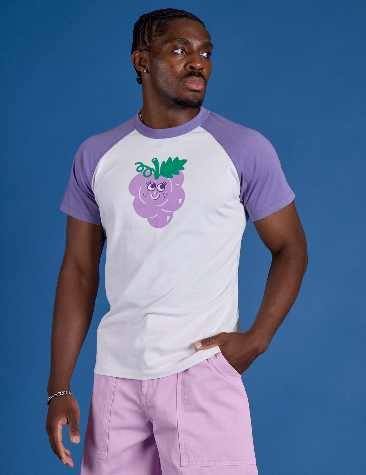 Issac is 5’10” and wearing M Produce Raglan Tee in Grape