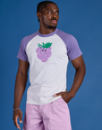 Issac is 5’10” and wearing M Produce Raglan Tee in Grape