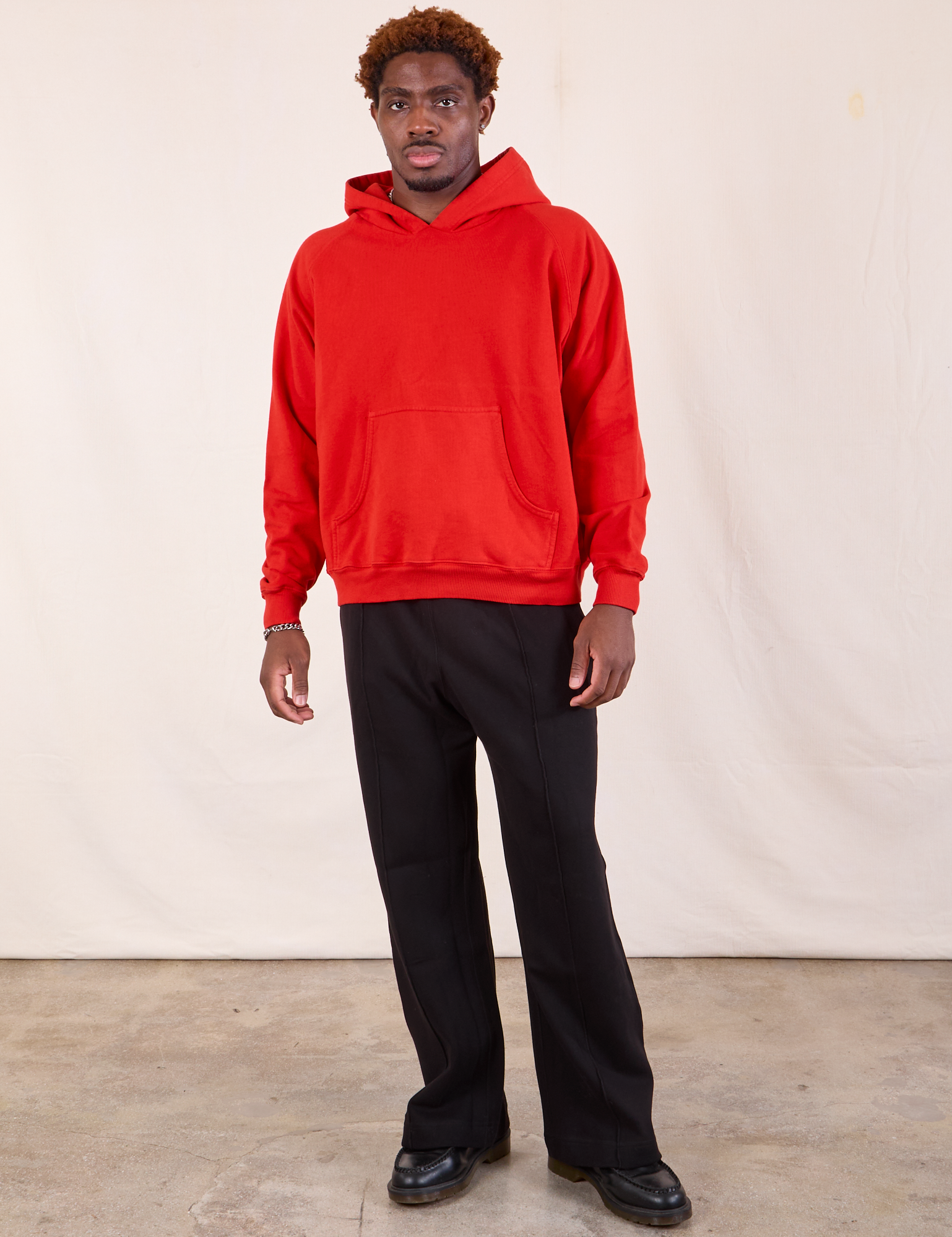 Red hoodie black pants sales