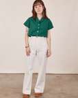 Hana is wearing Pantry Button-Up in Hunter Green tucked into vintage off-white Petite Western Pants