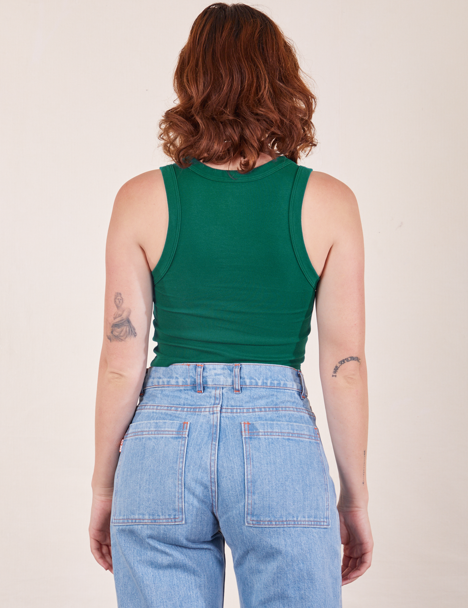 Back view of Cropped Tank Top in Hunter Green worn by Alex