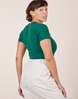 Angled back view of Baby Tee in Hunter Green worn by Tiara