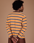 Long Sleeve Striped Burly Tee in Orange back view on Jerrod