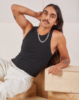 Anthony is wearing Racerback Tank in Basic Black