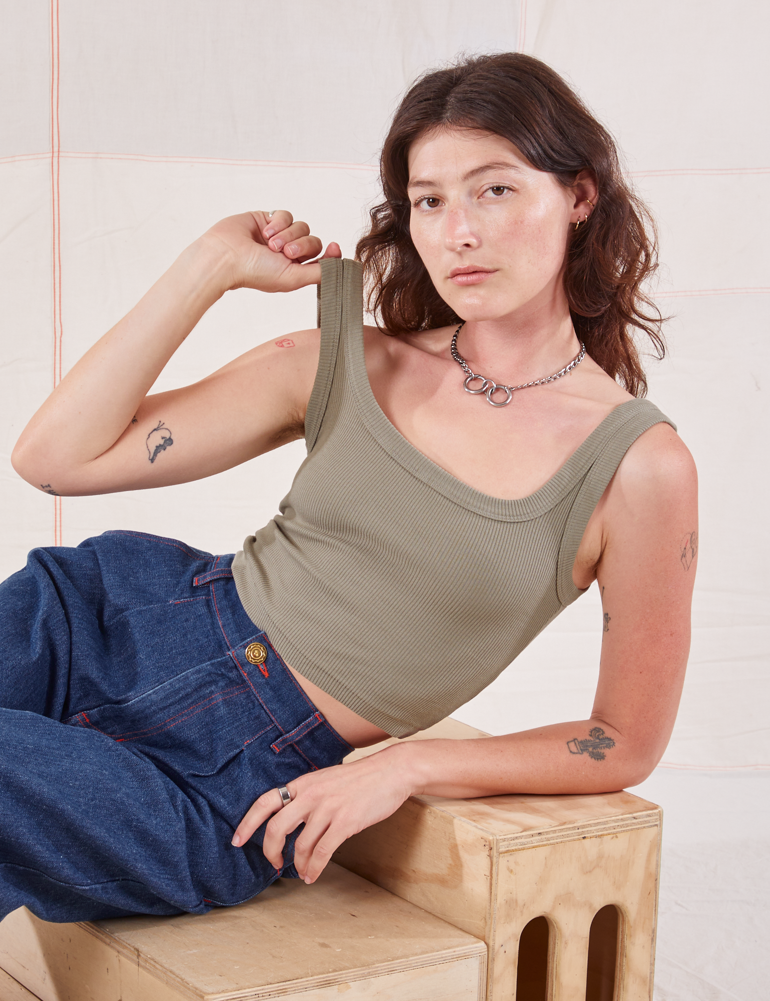 Alex is wearing Square Neck Tank in Khaki Grey