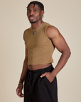 Angled front view of Muscle Tee in Desert Brown on Isaac