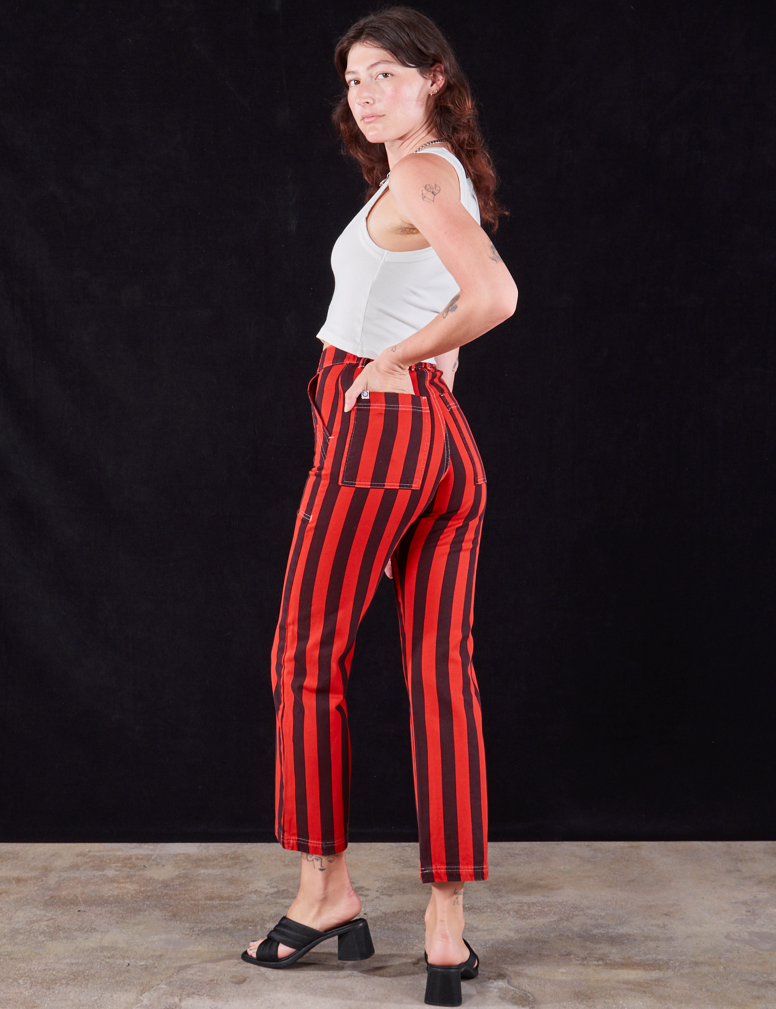 Black Stripe Work Pants in Mustang Red angled back view on Alex