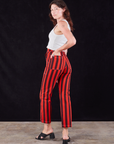 Black Stripe Work Pants in Mustang Red angled back view on Alex