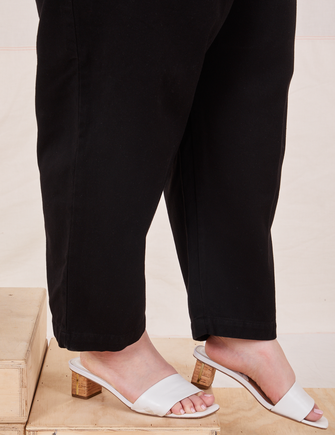 Pant leg close up of Organic Trousers in Basic Black worn by Ashley
