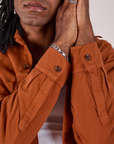 Twill Overshirt in Burnt Terracotta sleeve close up on Jerrod