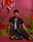 Paintstamped Pantry Button-Up in Poppy and matching Work Pants worn by Jesse