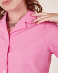 Front close up of Pantry Button-Up in Bubblegum Pink worn by Alex