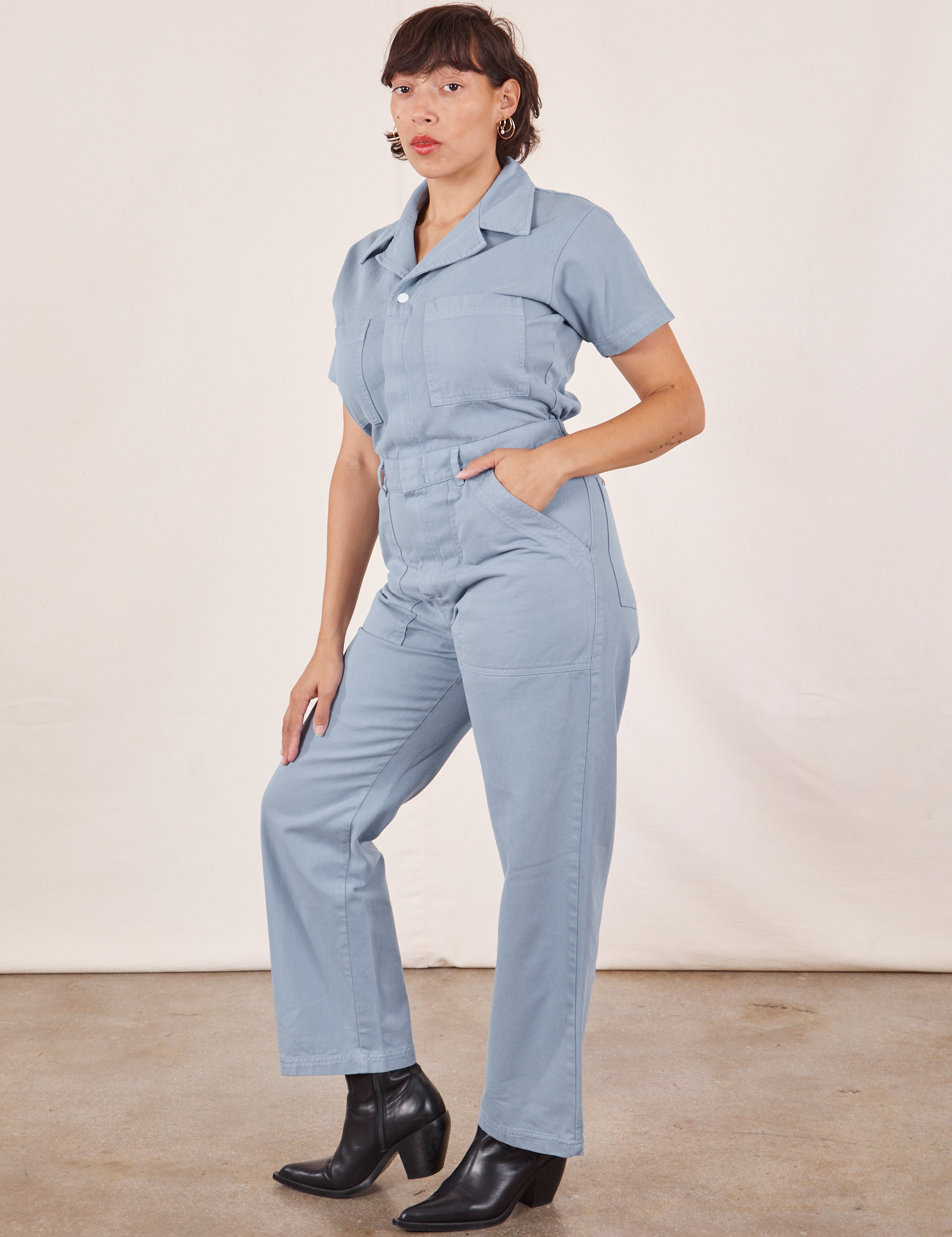 Tiara is 5&#39;4&quot; and wearing S Short Sleeve Jumpsuit in Periwinkle