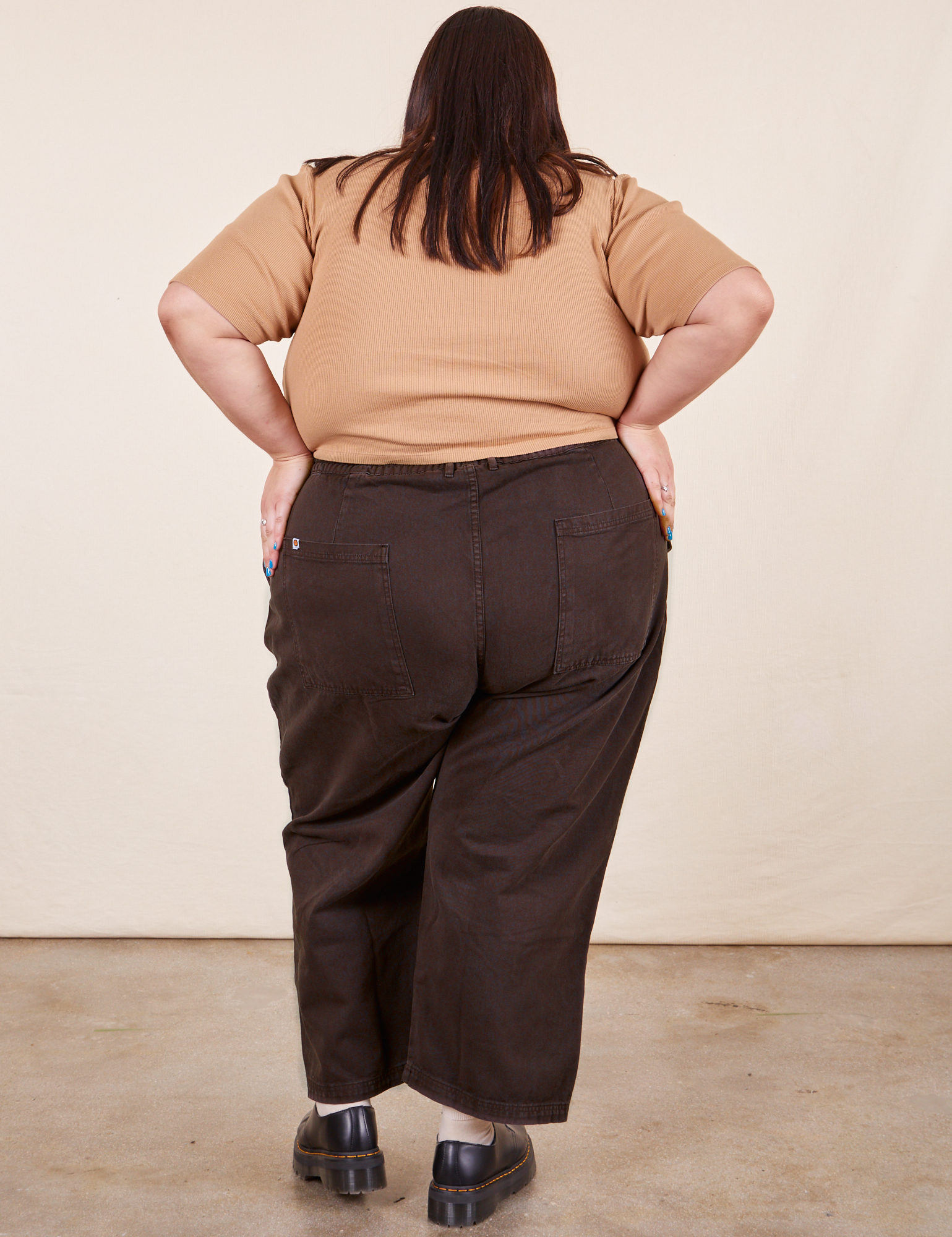 Work Pants in Espresso Brown back view on Sarita wearing tan 1/2 sleeve Turtleneck