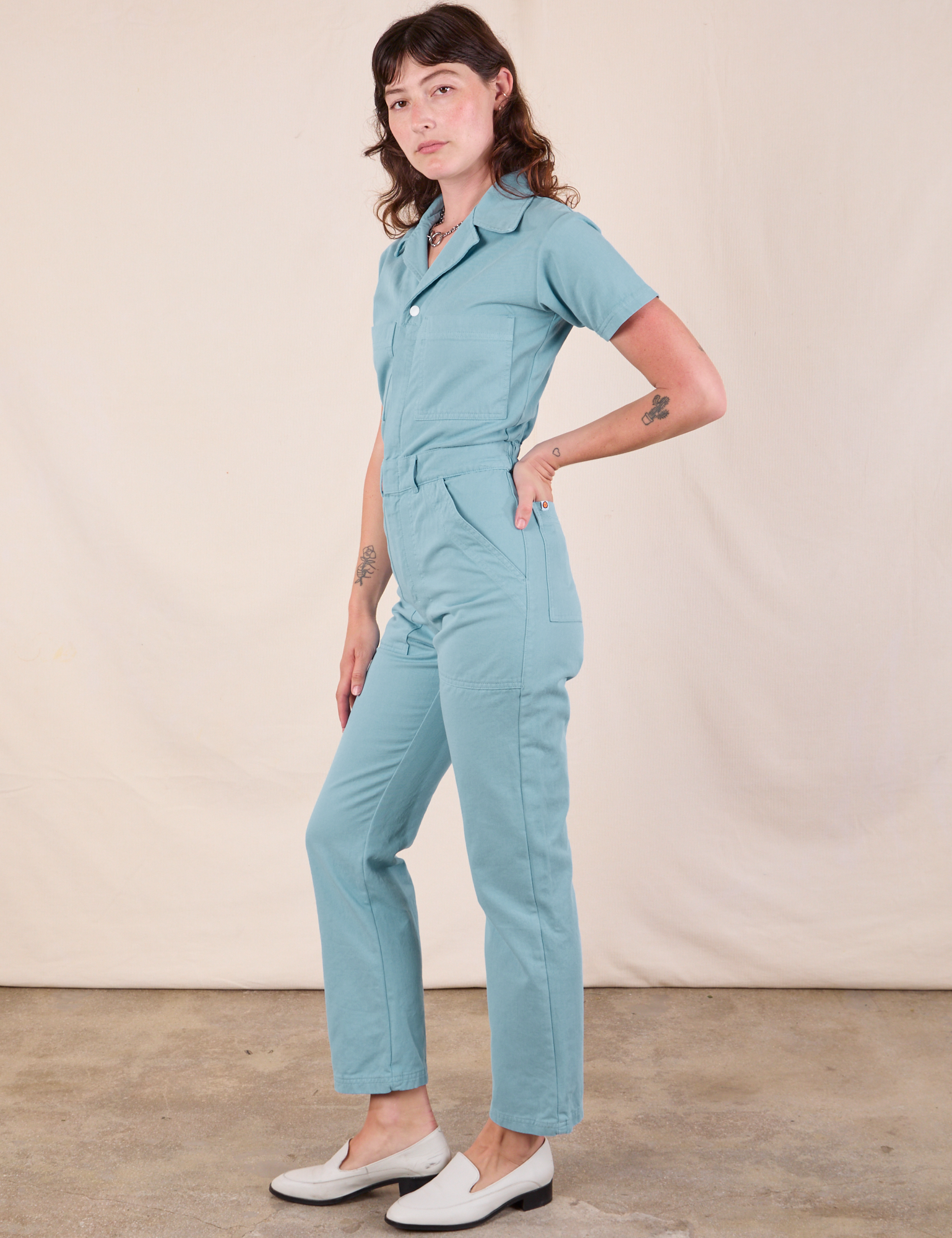 Short Sleeve Jumpsuit in Baby Blue side view on Alex