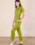 Short Sleeve Jumpsuit in Gross Green side view on Alex