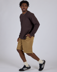 Side view of Longline Work Shorts in Desert Brown and espresso brown Long Sleeve Burly Tee on Isaac