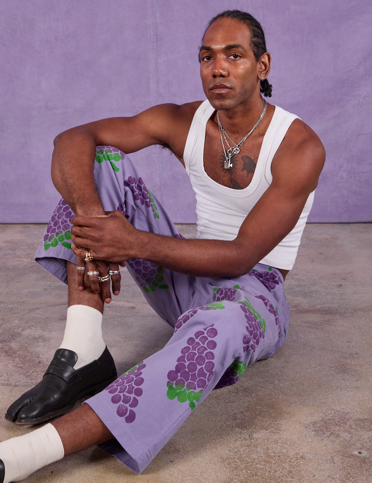 Paintstamped Work Pants in Grape and Cropped Tank in Vintage Tee Off-White worn by Jerrod