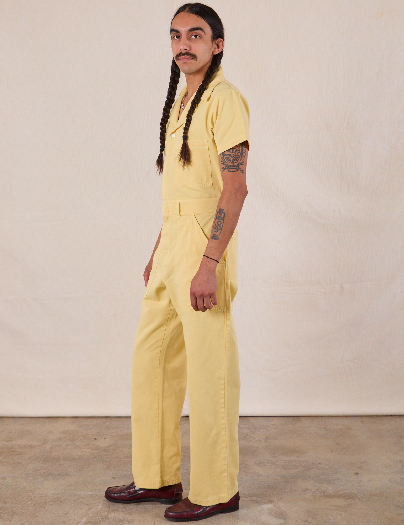 Short Sleeve Jumpsuit in Butter Yellow side view on Anthony