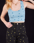 Close up of Star Cropped Tank and Star Bell Bottoms in black on Margaret