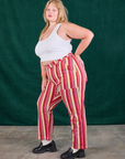 Side view of Stripe Work Pants in Cherry Candy and Cropped Tank in vintage tee off-white