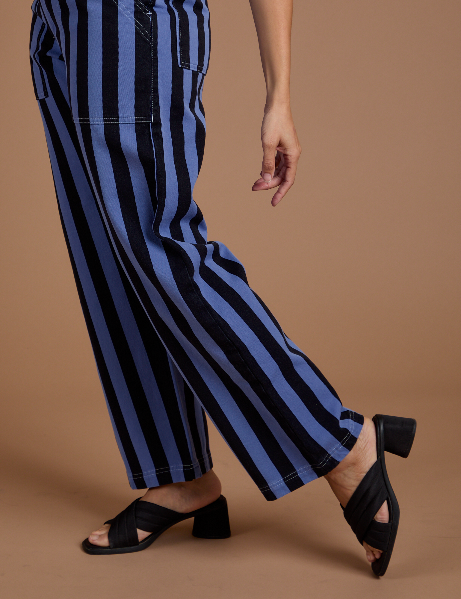 Pant leg close up of Black Stripe Work Pants in Cornflower Blue on Tiara