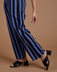 Pant leg close up of Black Stripe Work Pants in Cornflower Blue on Tiara