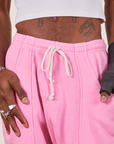 Cropped Rolled Cuff Sweatpants in Bubblegum Pink front close up on Jerrod