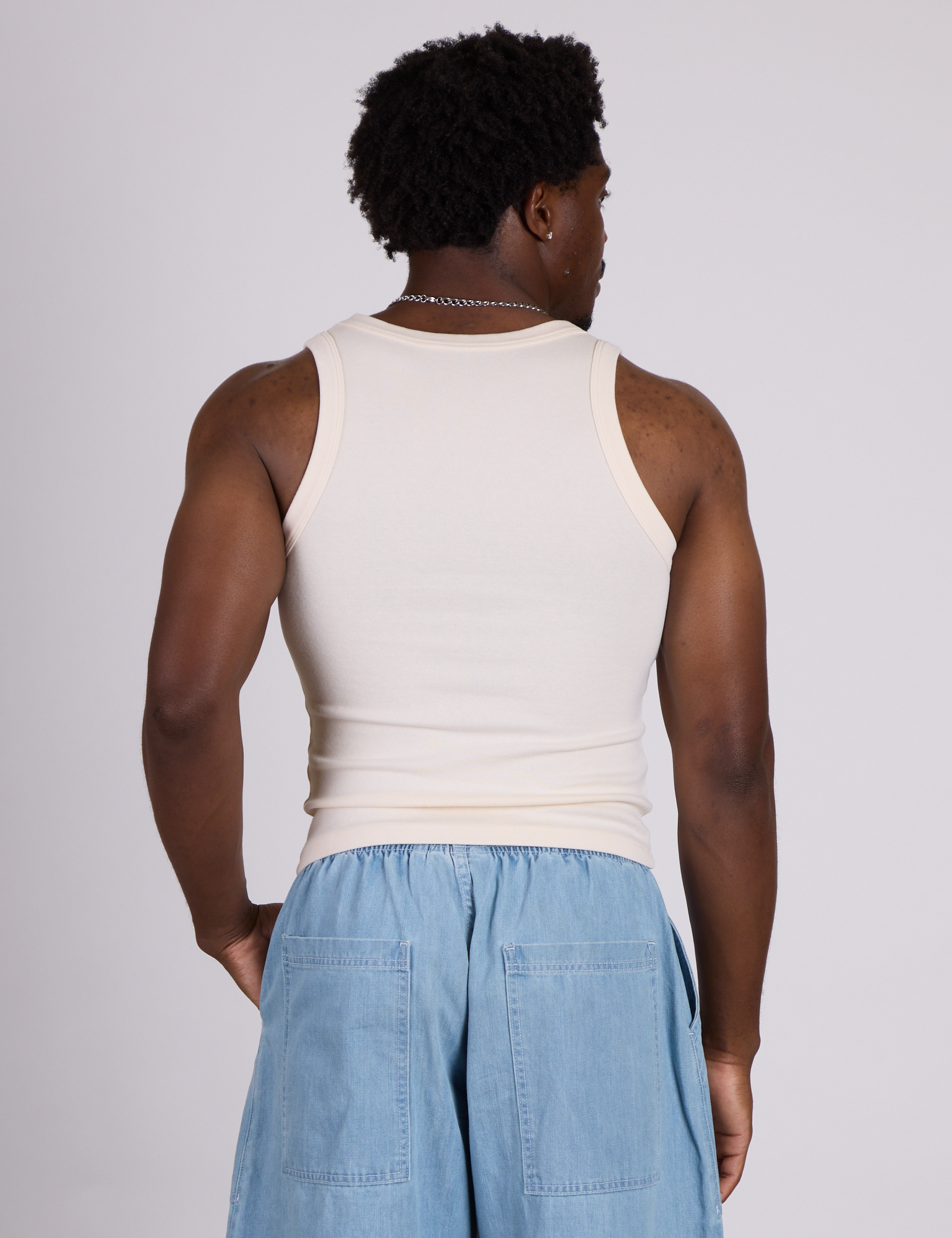 Back view of The Tank Top in Vintage Tee Off-White on Isaac
