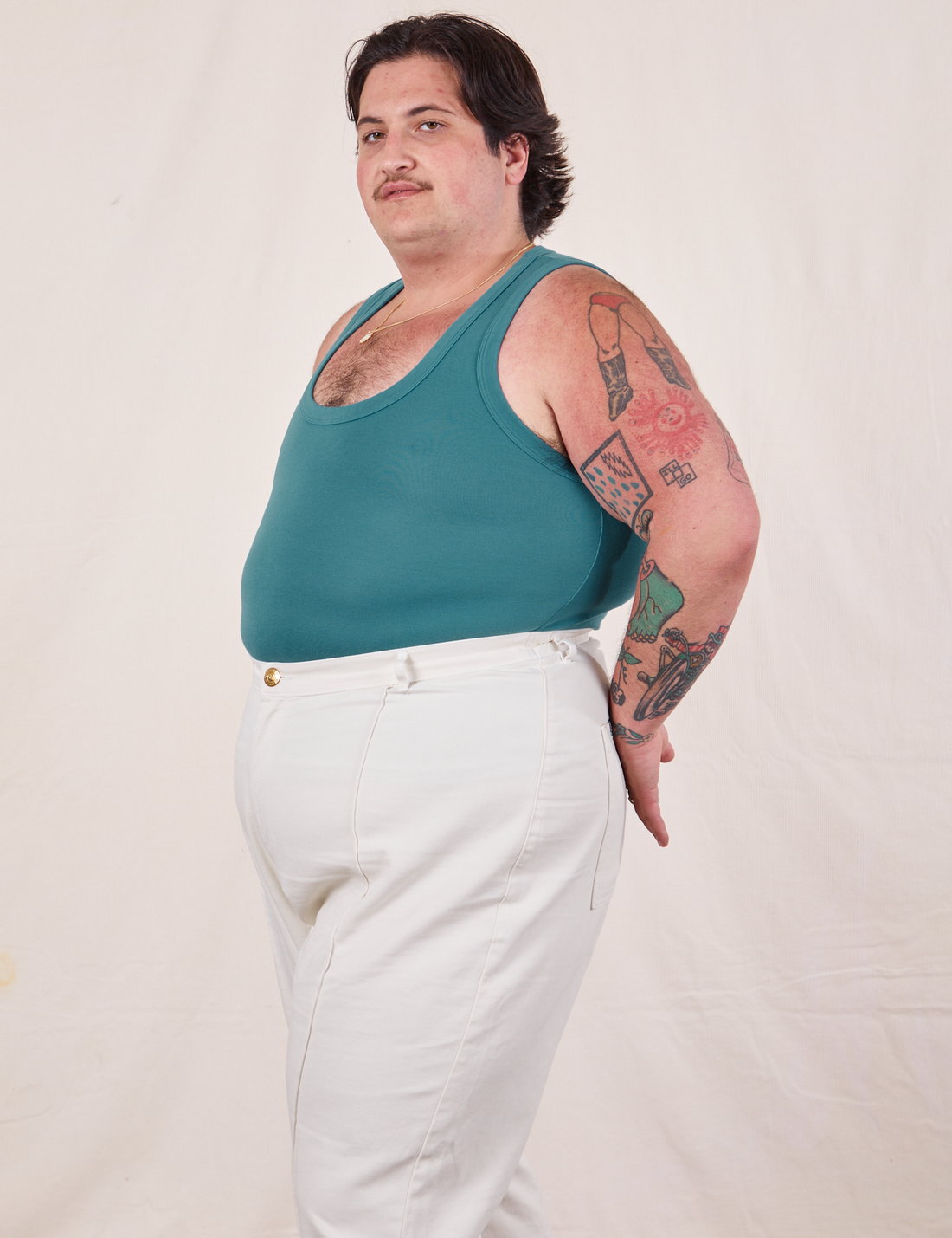 Tank Top in Marine Blue side view on Sam wearing vintage off-white Western Pants