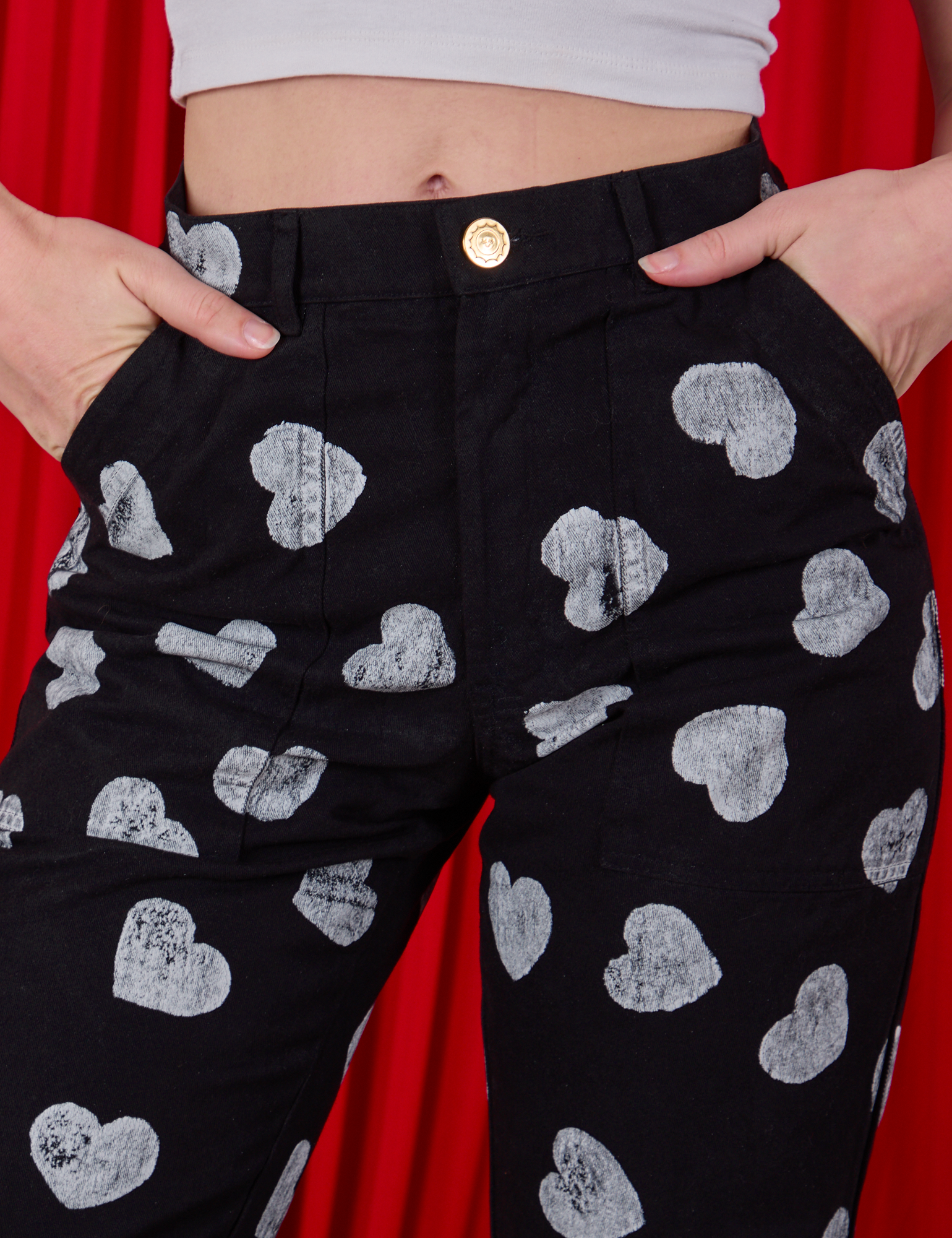 Paintstamped Heart Work Pants in Black front close up on Alex