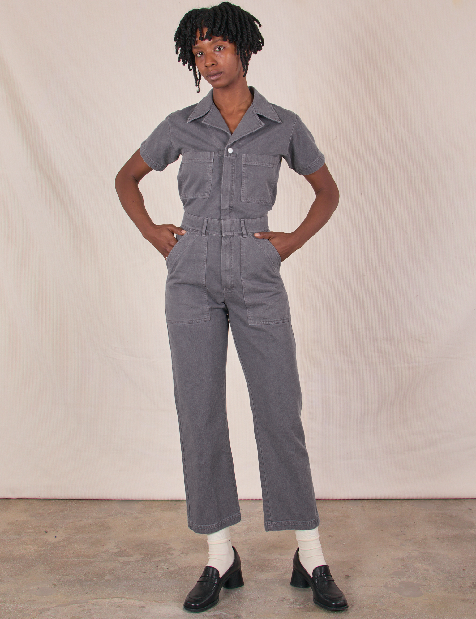 Cheyann is 5&#39;11&quot; and wearing XS Short Sleeve Jumpsuit in Washed Grey